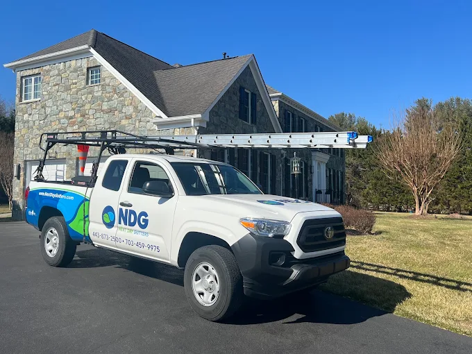 Next Day Gutters truck at a Baltimore County materials only gutter drop